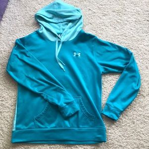 Under Armour blue sweatshirt.